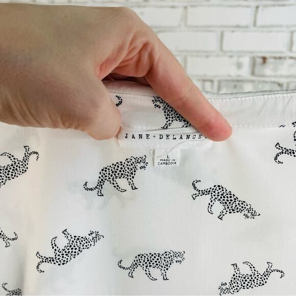 Jane & Delancey White Black Animal Print Short Sleeve Drop Shoulder Button Down - Picture 6 of 6